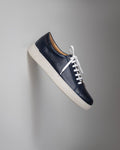 Sneaker generique bleu marine en cuir